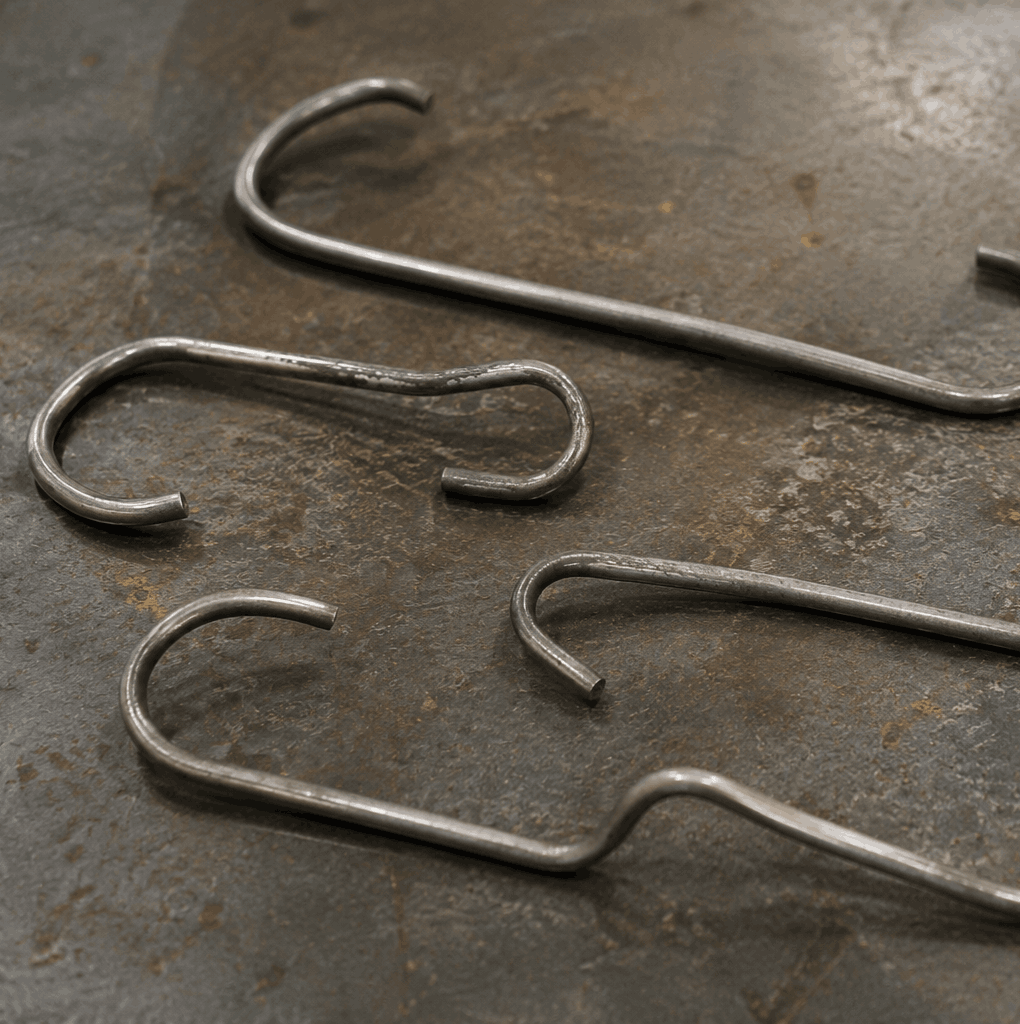 Bent and misshapen powder coating C hooks