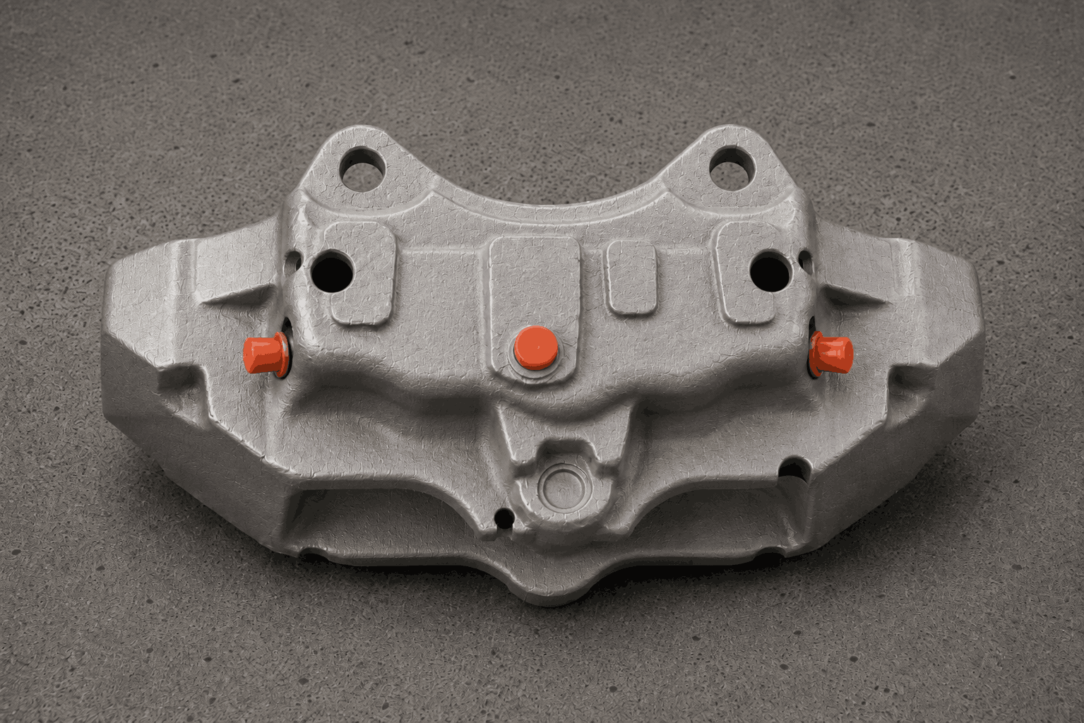 Masked unfinished automotive brake caliper